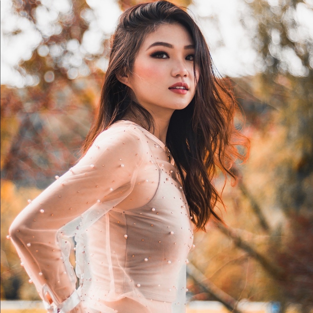 Sheer top with pearl accents